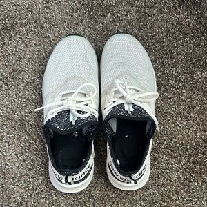 White and Black New Balance Athletic Sneakers